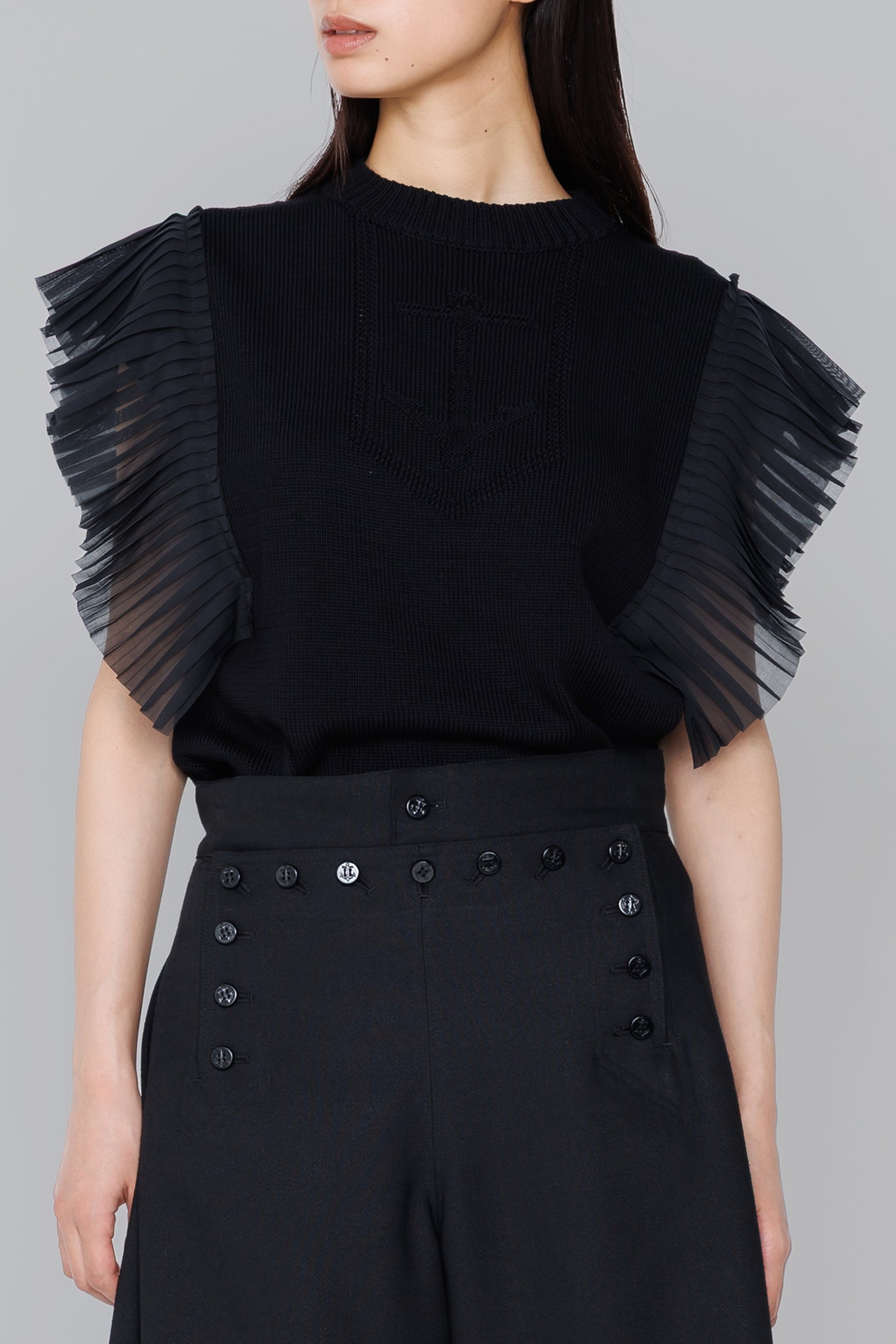 SLEEVELESS PLEATED GUERNSEY KNIT