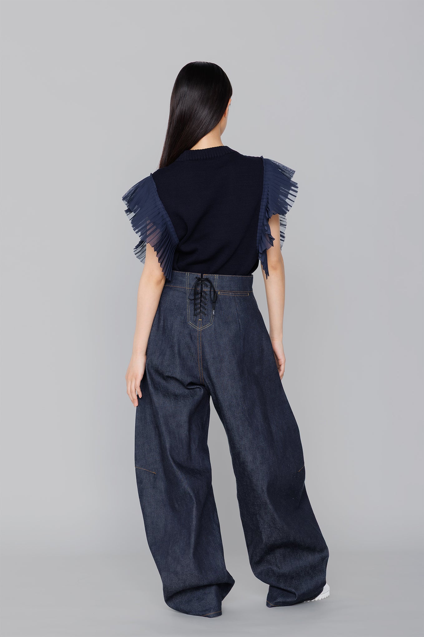 SLEEVELESS PLEATED GUERNSEY KNIT