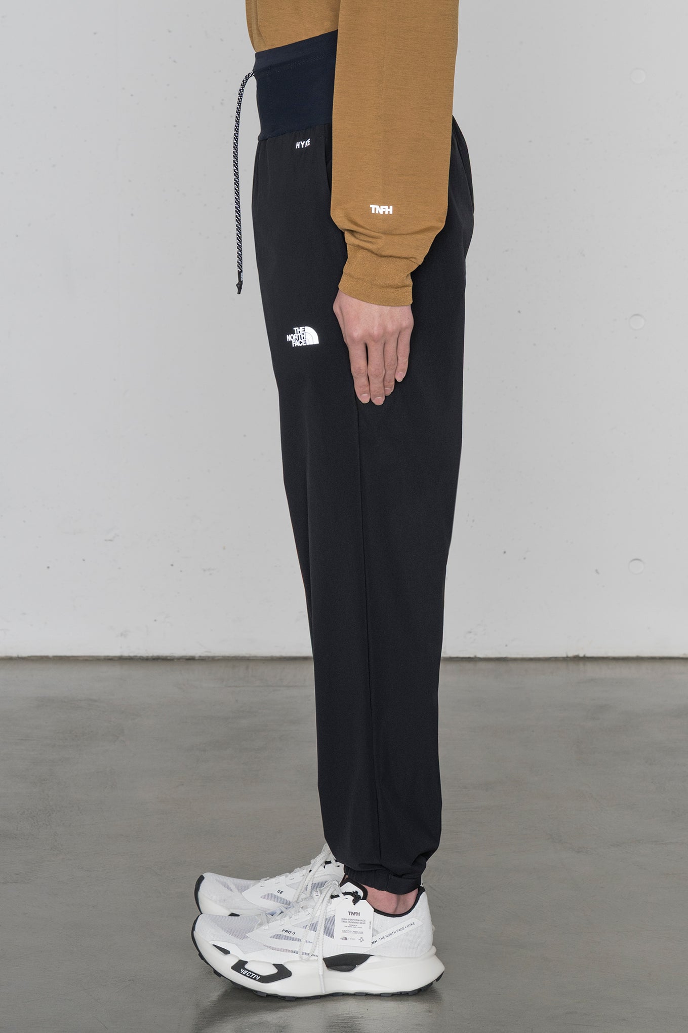 NB255HK<br> Trail Long Pant (Men's)<br> TNFH  THE NORTH FACE × HYKE