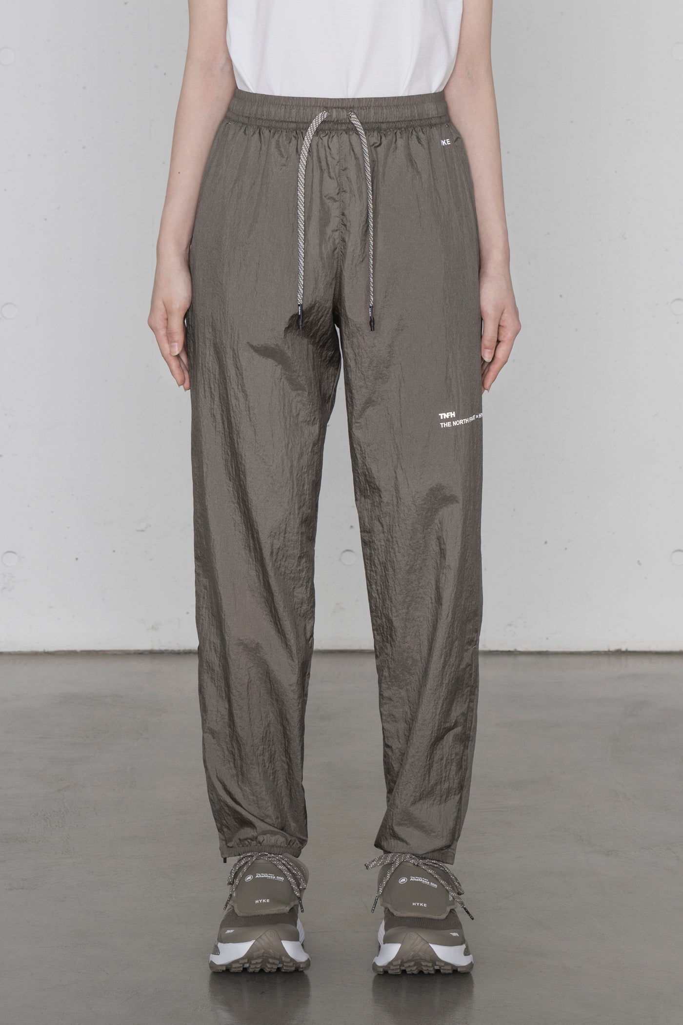 NBW253HK Trail Wind Pant (Women's) TNFH THE NORTH FACE × HYKE